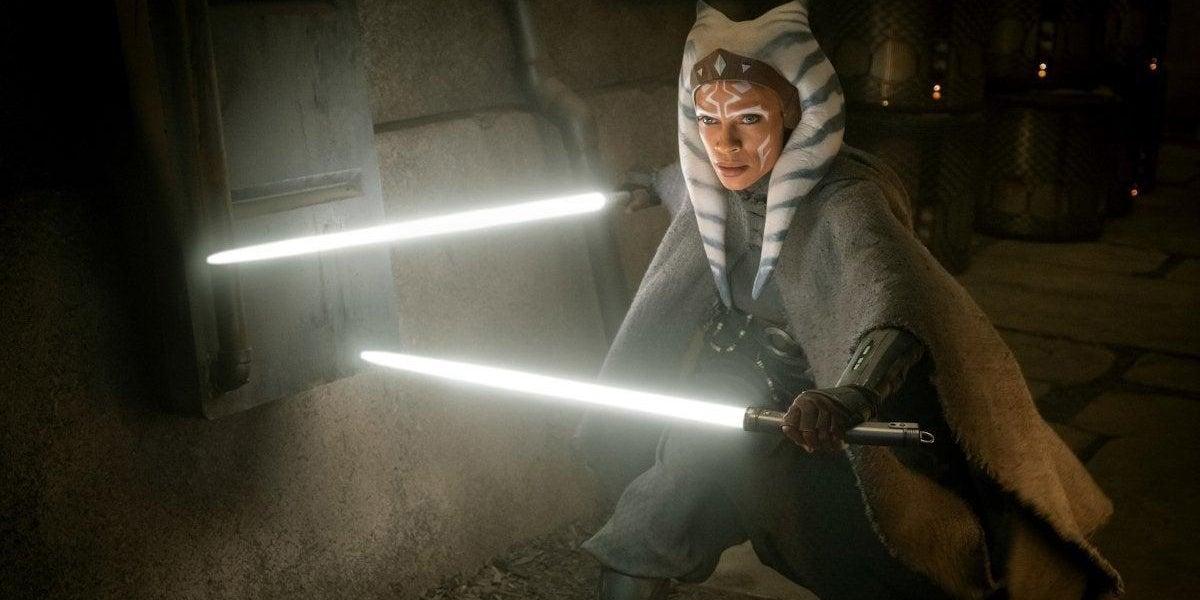 Rosario Dawson as Ahsoka Tano wielding two white lightsabers