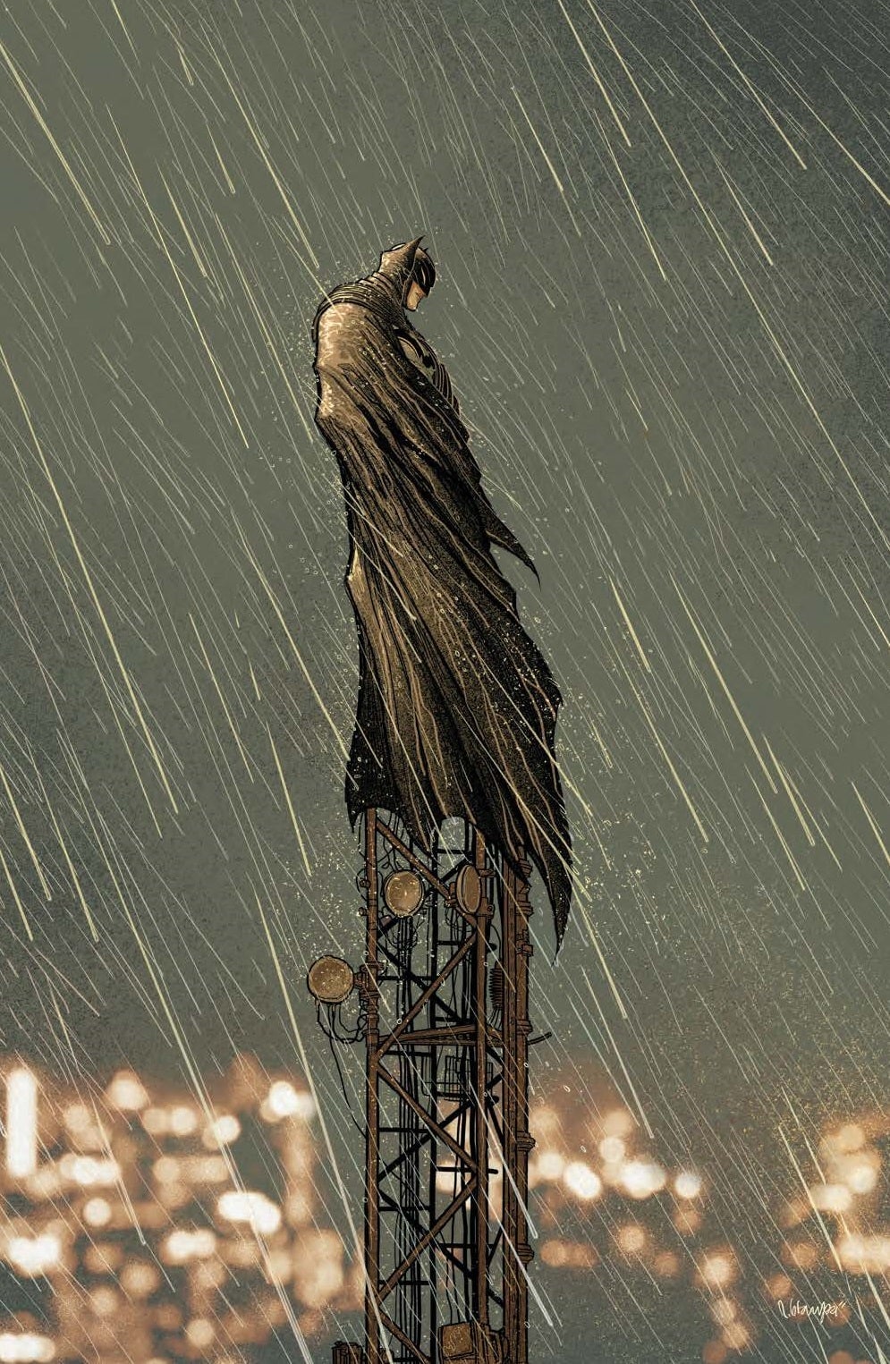 Batman stands alone in the rain