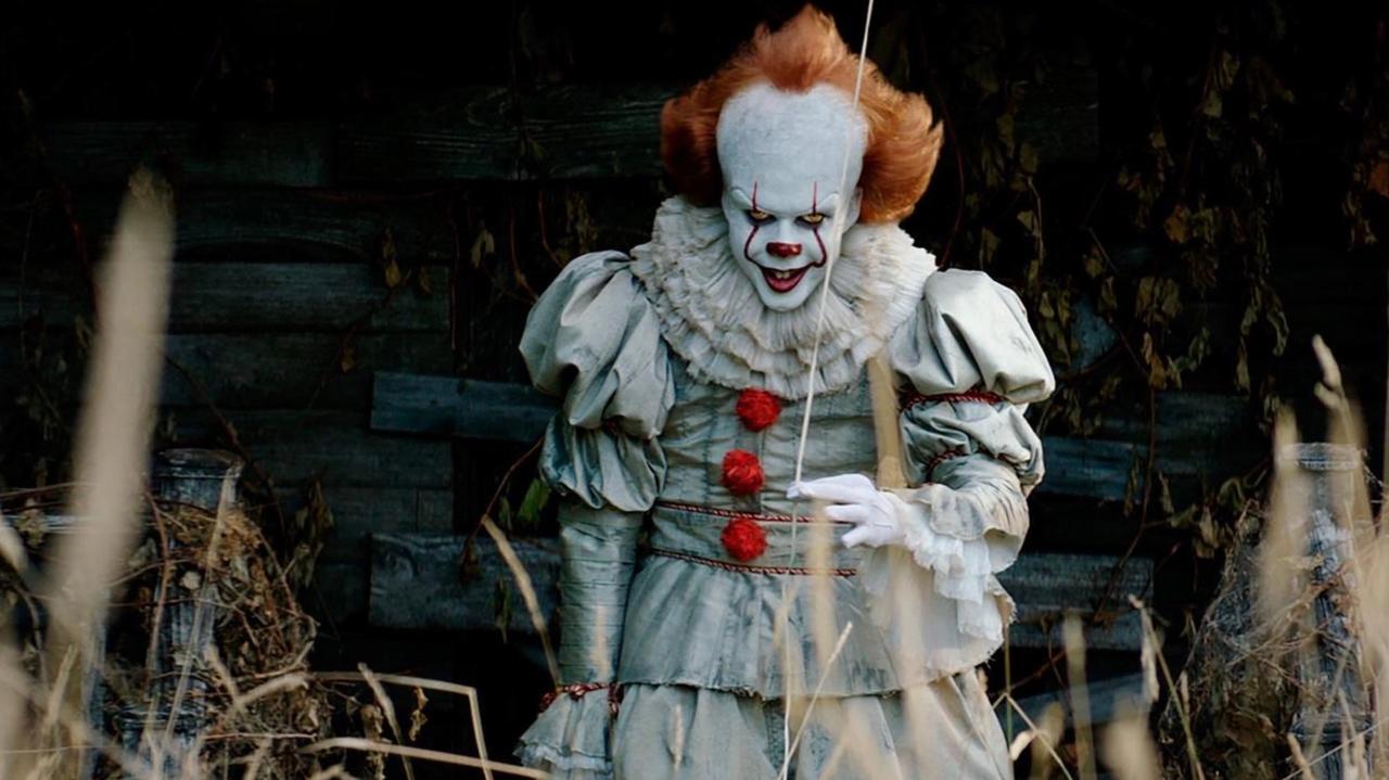 A still of Bill Skarsgård as Pennywise in It: Chapter One