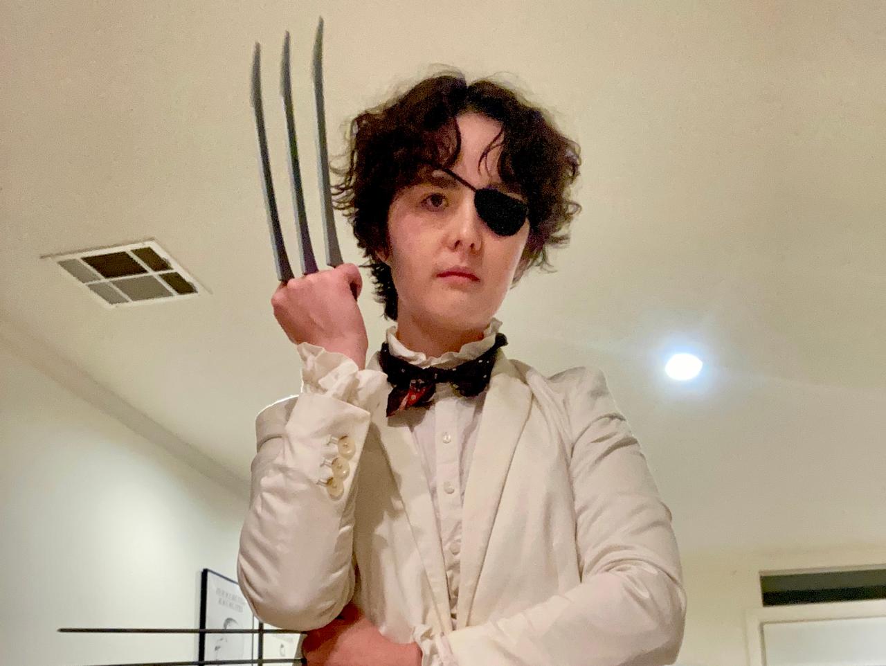 An image of Jules Chin Greene cosplaying as Wolverine (Patch)