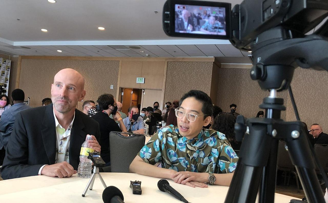 Image of Cliff Chiang and Brian K. Vaughan at interview table.