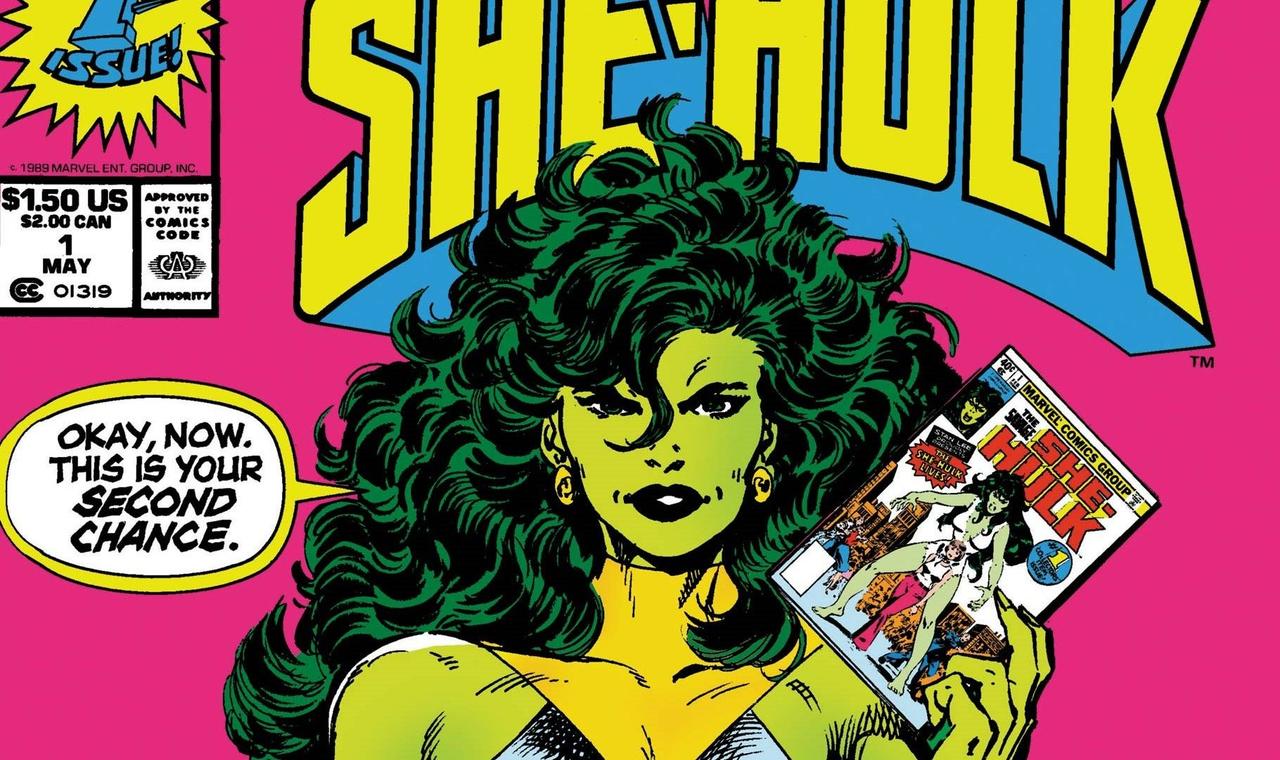 Cropped cover of the first issue of Sensational She-Hulk, as She-Hulk speaks to the reader, holding up her comic