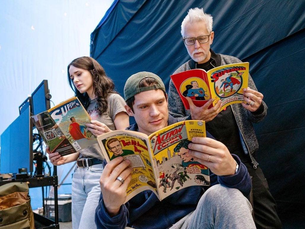 David Corenswet, Rachel Brosnahan, and James Gunn reading Superman comics on the set of Superman (2025)