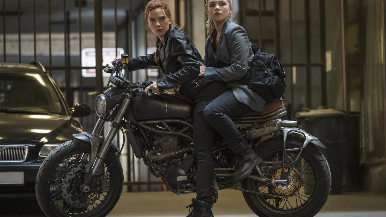 Florence Pugh and Scarlet Johansson on motorcycle in Black Widow