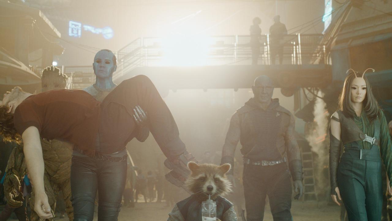 Still promotional image featuring the Guardians of the Galaxy wearing civilian clothes walking side by side